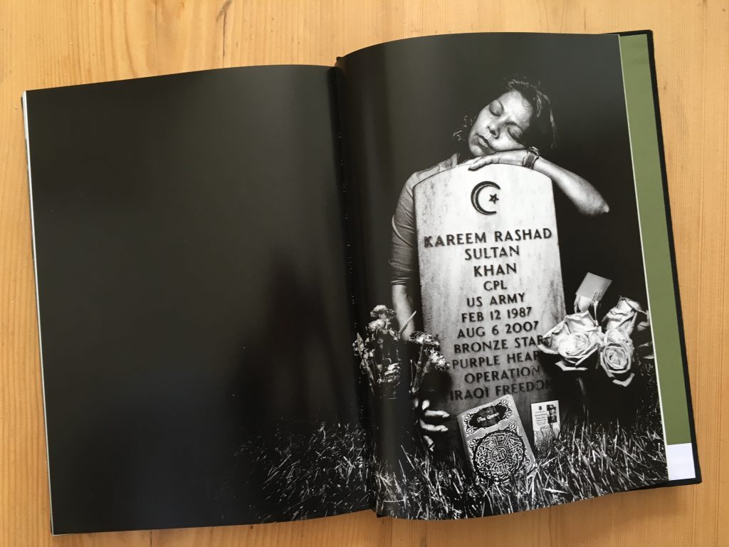 The image of Kareem Rashad Sultan Khan’s grave with his grieving mother from Platon's photo essay "Service". 